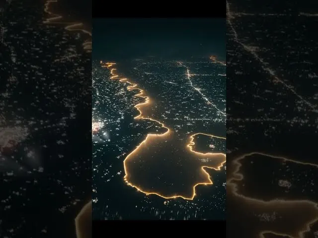 India-Pakistan border seen from aircraft window at night with city lights below
