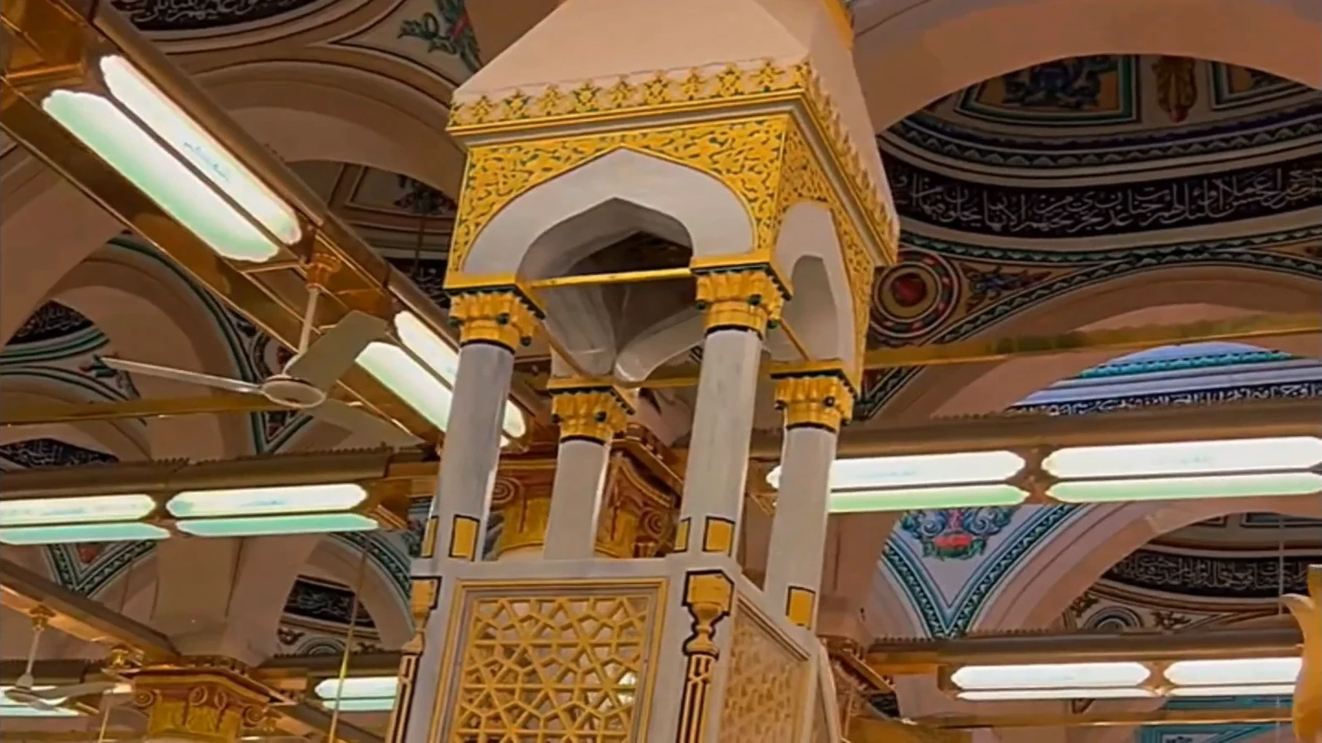 Ornate Mihrab inside Masjid Nabawi, intricate black, gold and marble craftsmanship