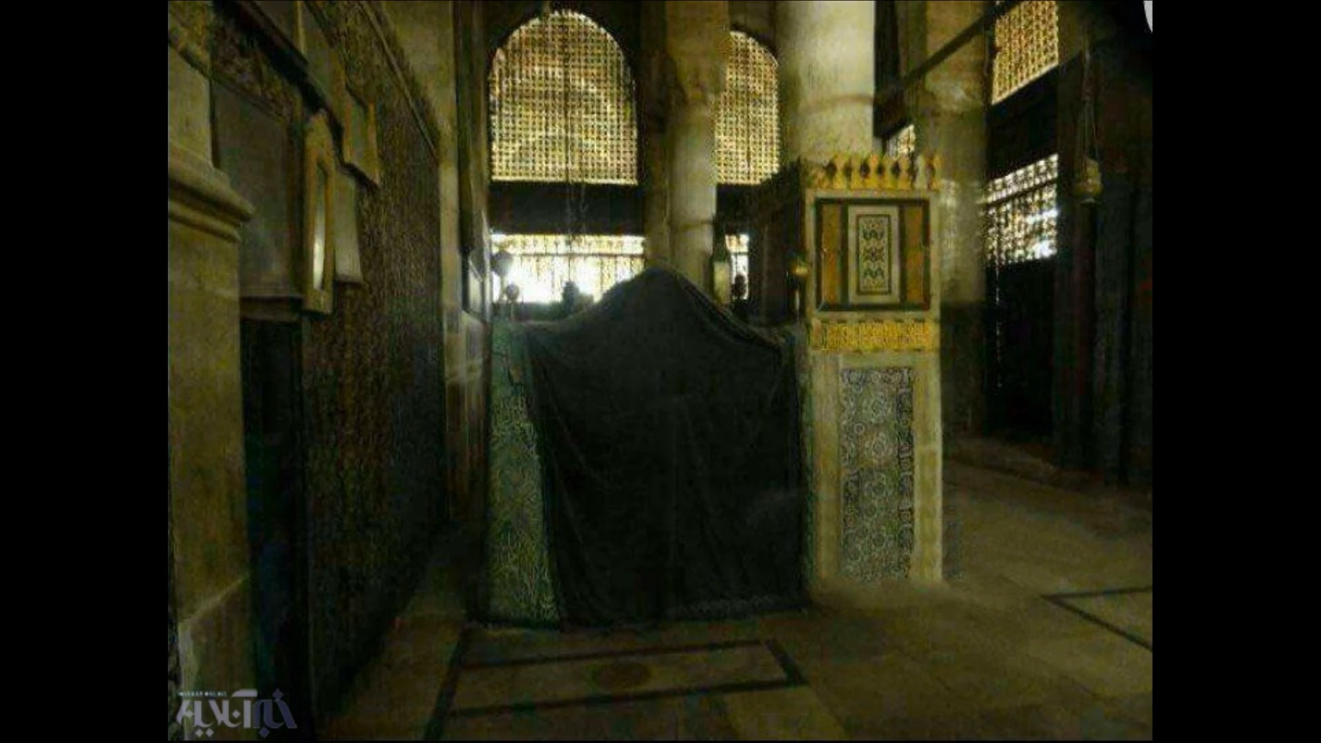 Rare archival footage of the interior near the Rawdah, the black-draped structure beside the sacred walls