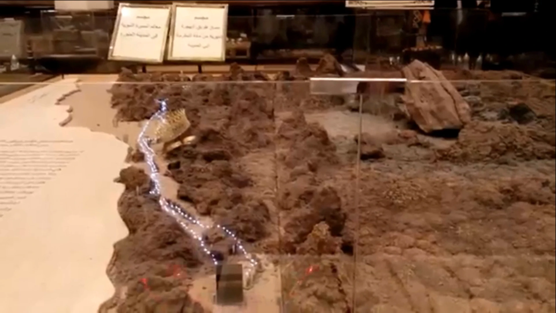 Museum model of the Khandaq trench with blue LED lights marking the path, Battle of the Trench site in Madinah