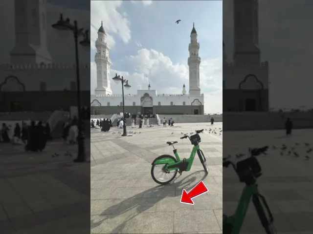 Rent green shared bikes near Quba Mosque to easily explore surrounding holy sites in Madinah